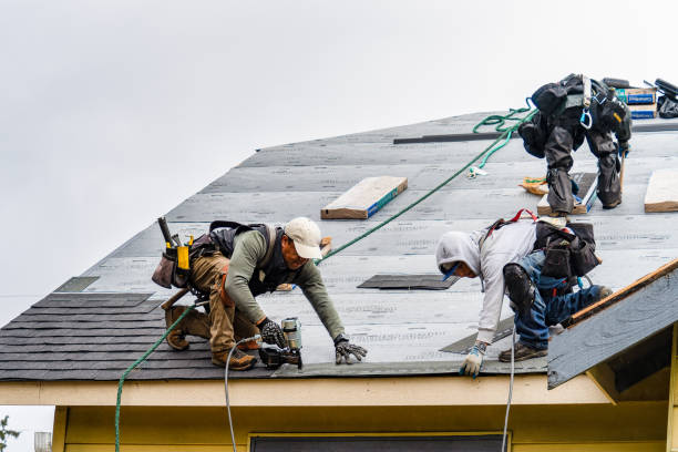 Professional Gutter Installation technician working in Springfield Gardens, NY